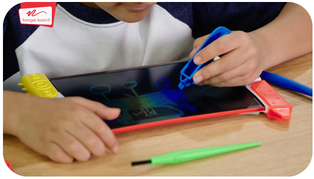 Boy writing on Scribble n Play